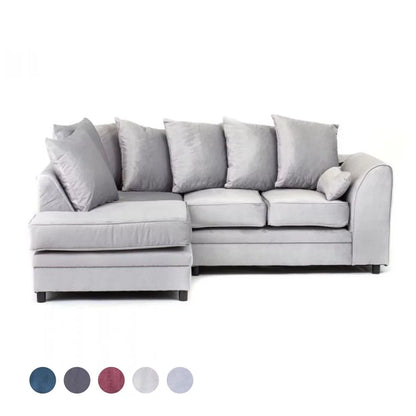 A light grey velvet corner sofa with multiple cushions, showcasing its design and color against a white background with a label at the bottom corner.