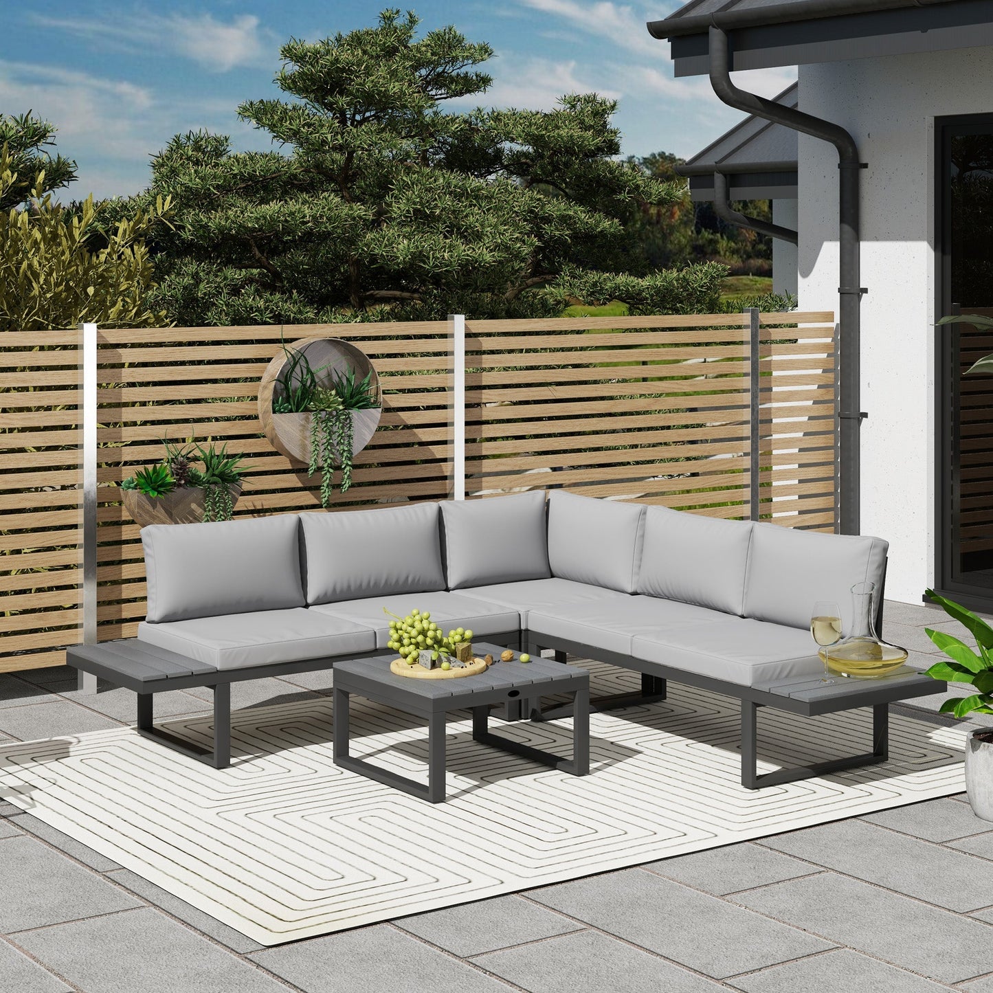 Outsunny 4 Pieces Garden Furniture Set, 5-Level Reclining Garden Corner Sofa Set, Outdoor Lounge Conversation Sectional with Cushions, Wood Effect Plastic Table, Black Frame & Light Grey Cushion
