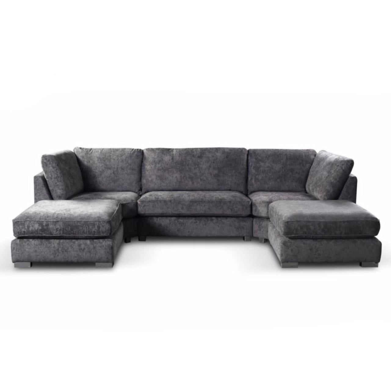 A gray upholstered chenille U-shape high back corner sofa with a hardwood frame and shimmery chrome legs, featuring deep foam interiors and large piped fiber backs.