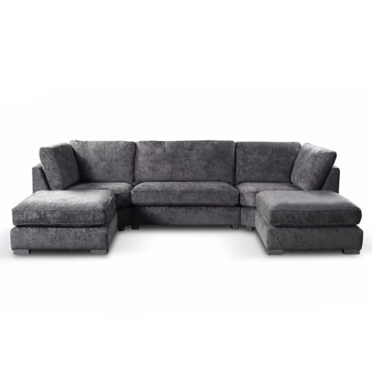 A gray upholstered chenille U-shape high back corner sofa with a hardwood frame and shimmery chrome legs, featuring deep foam interiors and large piped fiber backs.